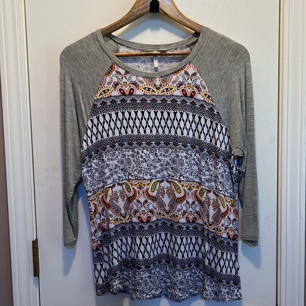 NWOT. Jersey style cotton T. Multicolored. Paisley and geometric patterns.